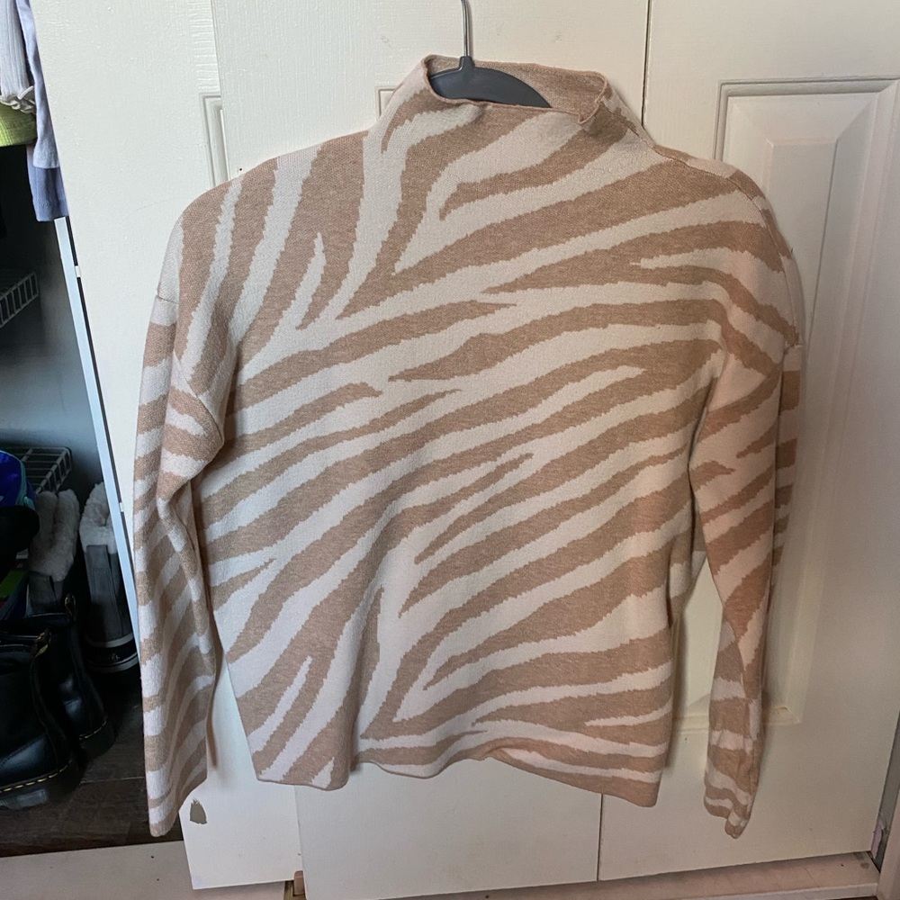 Zebra print turtleneck sweater